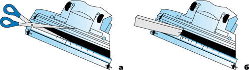 Очистка турбощетки: а — срезание волос ножницами, б — удаление остатков волос щелевой насадкой